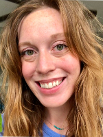 Headshot of woman iwith long hair