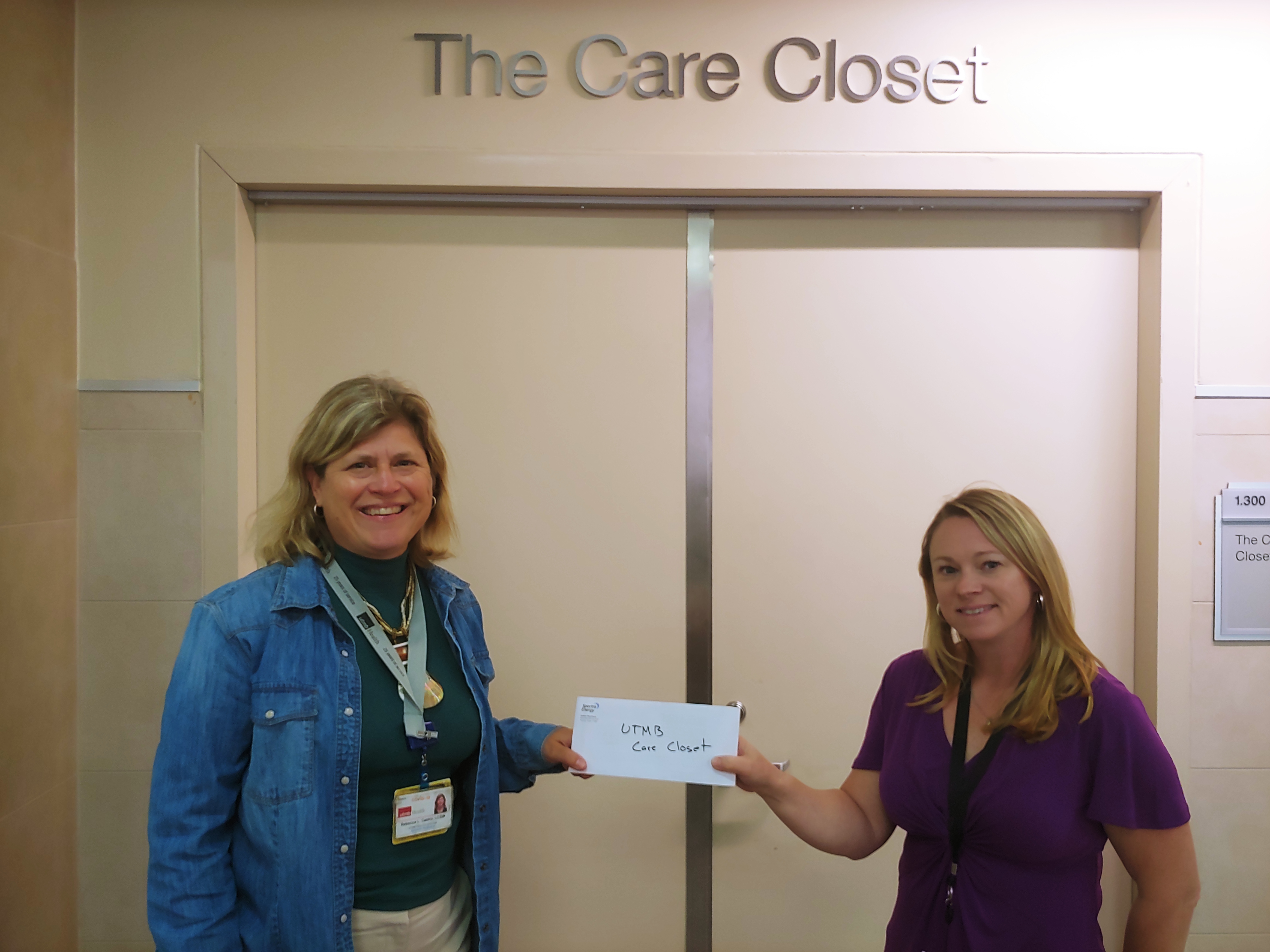 Photo of two women in front of Care Closet