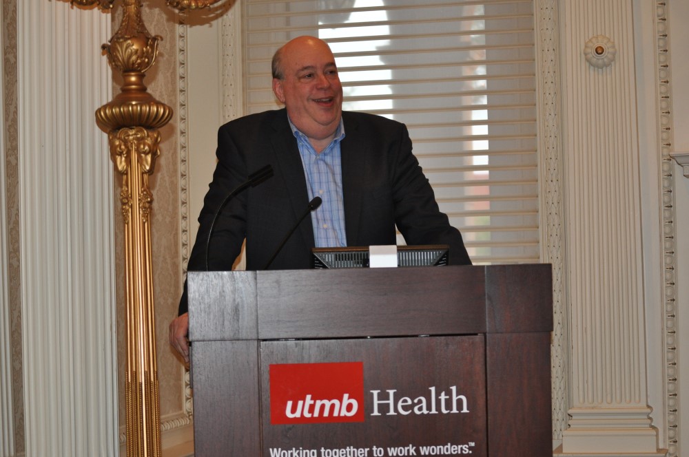 Photo of Clifford Saper, MD at podium