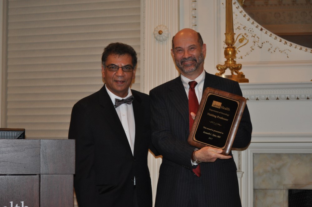 Photo of Drs. Bhardwaj and Tyler with award plaque