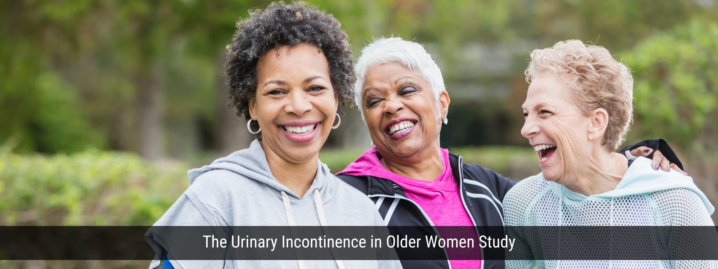 three older woman laughing together outdoors