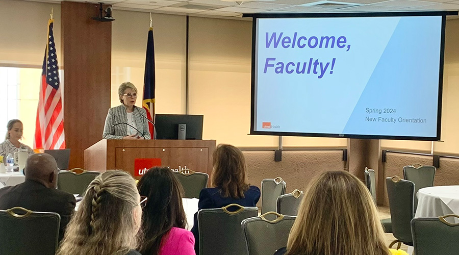 Dr. Chubinskaya giving a presentation to a group of new faculty members