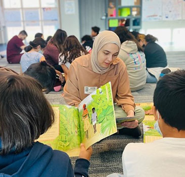 GulfCoastCommunity Residents Reading to Students