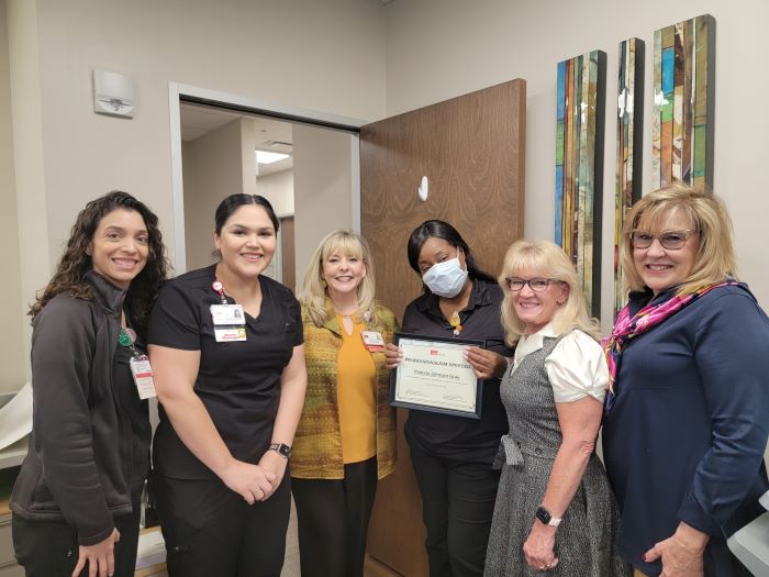 Pamela Johnson (center) received recognition