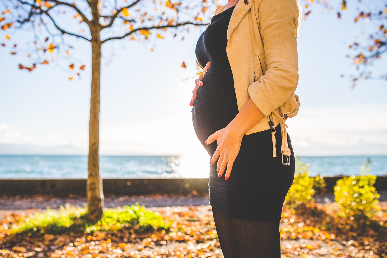 pregnant woman in fall