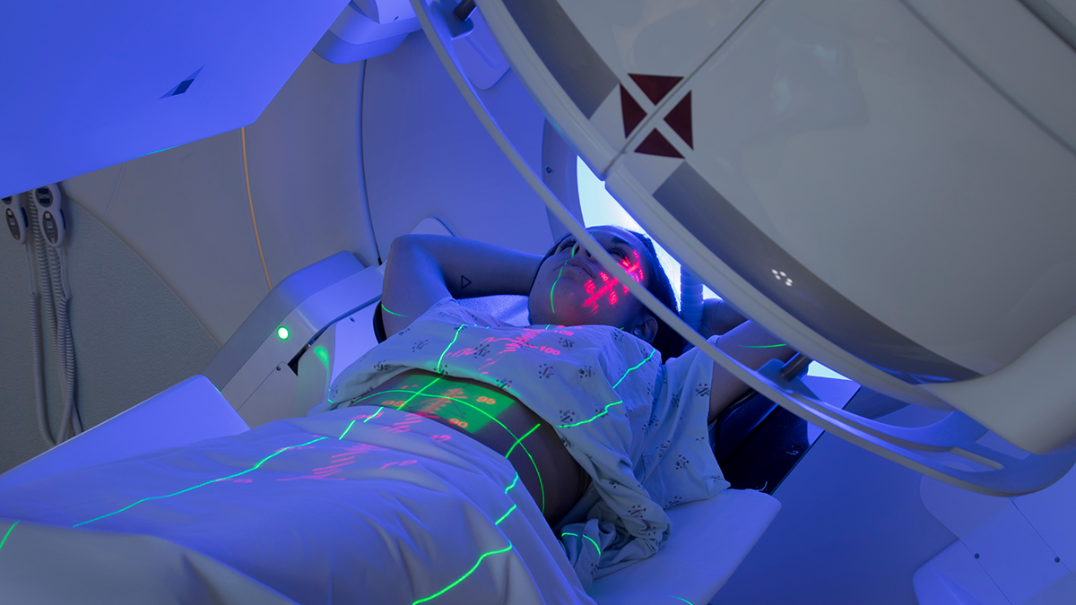 A woman is having radiation therapy