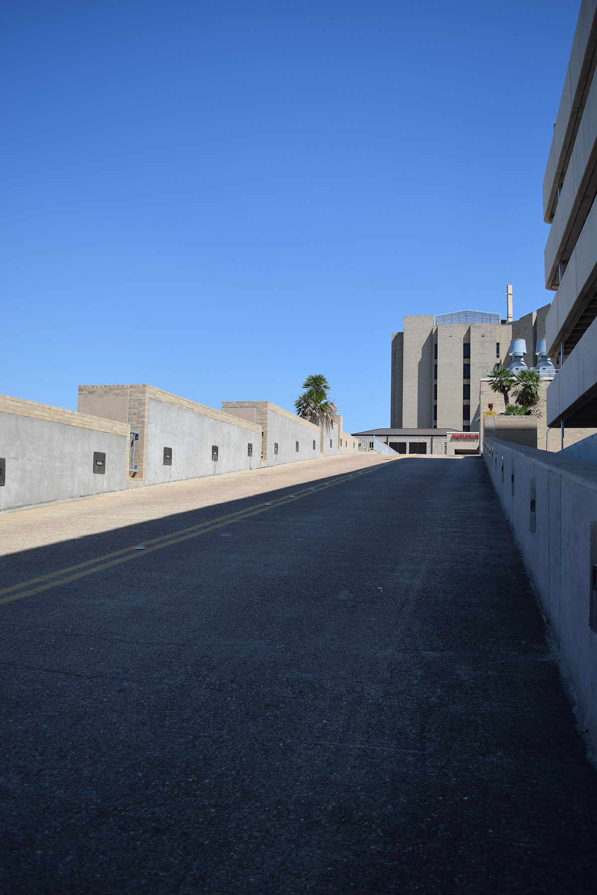 An uphill ramp leading to a building