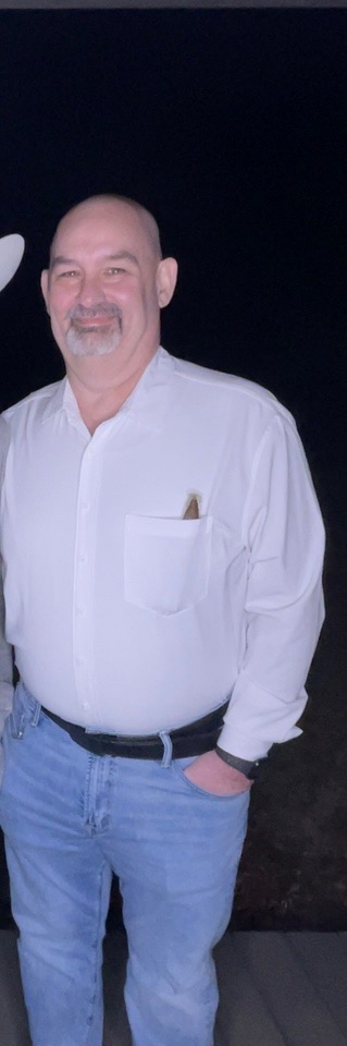 IMG_1988 man standing with hand in pocket